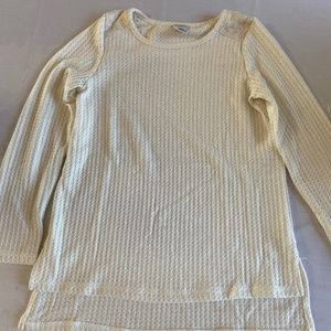 Cream and gold shirt with lace top of shoulder